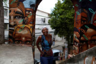 Ligia, the owner of Pousada Favela Cantagalo hostel, poses for a photograph near her hostel in Cantagalo favela, in Rio de Janeiro, Brazil, May 1, 2016. REUTERS/Pilar Olivares