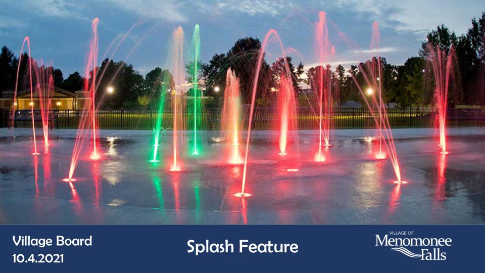 According to the plan for Village Park in Menomonee Falls, there will be a splash feature with sensor-activated fountains and colored LED lighting. This plan, Phase 2, is slated to be completed by the end of October.