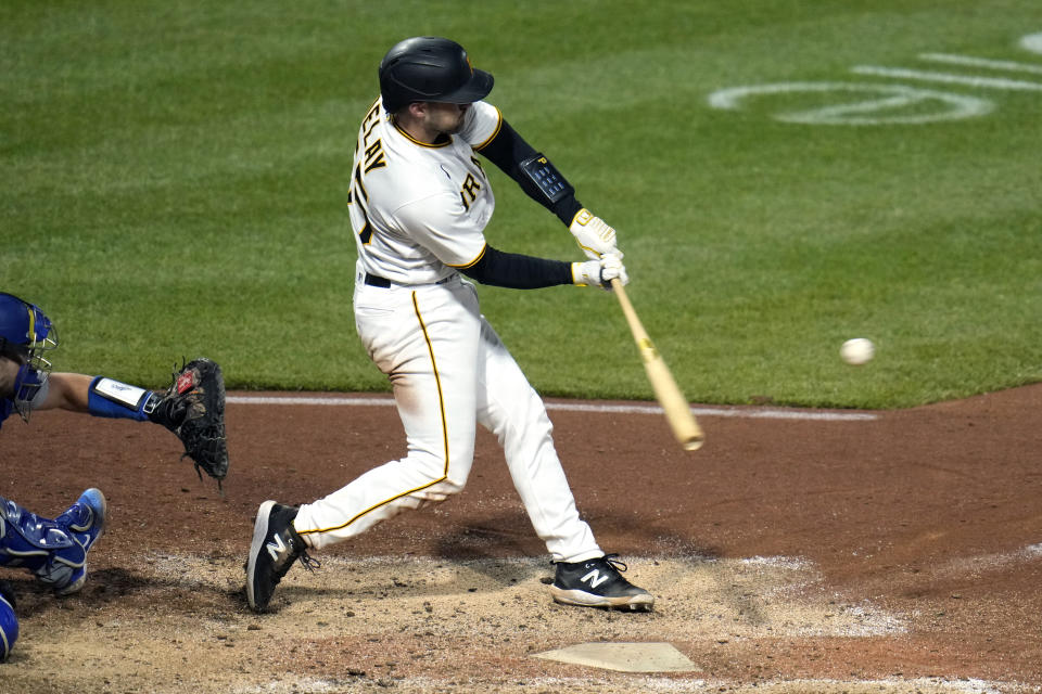 Pittsburgh Pirates' Jason Delay doubles off Los Angeles Dodgers relief pitcher Alex Vesia, driving in two runs during the seventh inning of a baseball game in Pittsburgh, Wednesday, April 26, 2023. (AP Photo/Gene J. Puskar)