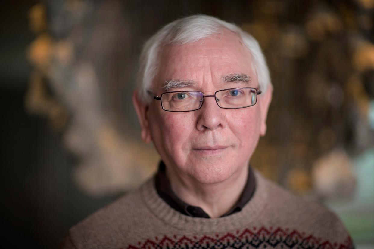 British filmmaker Terence Davies, seen here at Berlin Film Festival in 2016, has died at 77.