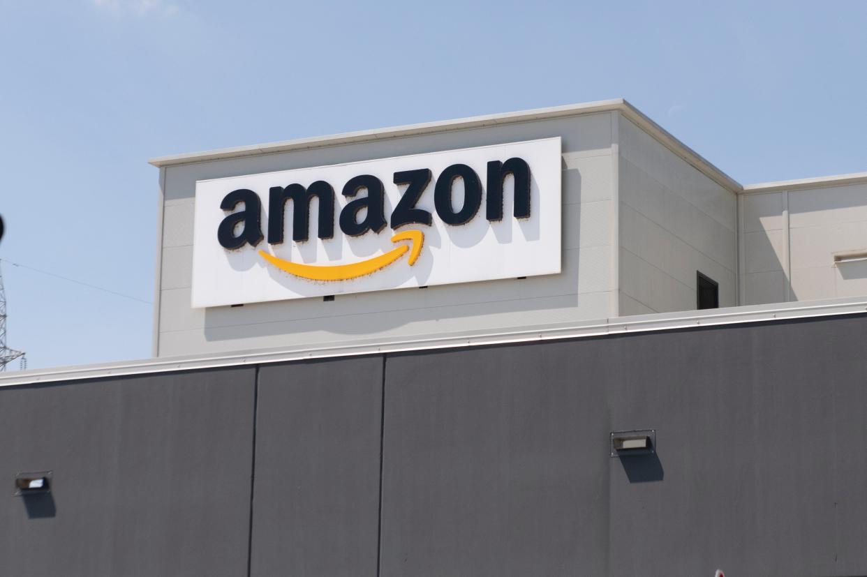 The Amazon logo can be seen at a location in Torrazza Piemonte near Turin, Italy 3 June, 2021. The company’s median worker reportedly made less than $30,000 last year.  (Getty Images)