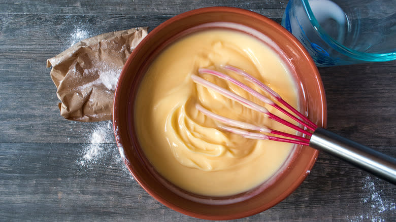 vanilla pudding with whisk