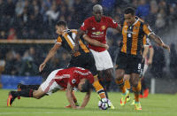 Football Soccer Britain- Hull City v Manchester United - Premier League - The Kingston Communications Stadium - 27/8/16 Manchester United's Paul Pogba and Zlatan Ibrahimovic in action with Hull City's Jake Livermore and Tom Huddlestone Action Images via Reuters / Lee Smith Livepic EDITORIAL USE ONLY. No use with unauthorized audio, video, data, fixture lists, club/league logos or "live" services. Online in-match use limited to 45 images, no video emulation. No use in betting, games or single club/league/player publications. Please contact your account representative for further details.