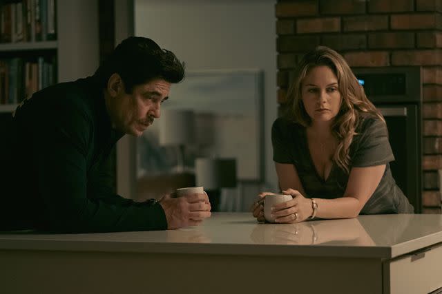 <p>Daniel McFadden/Netflix</p> Benicio Del Toro and Alicia Silverstone in "Reptile"
