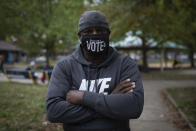 Rev. Mark Tyler poses for a photo in a park in Philadelphia on Wednesday, Oct. 28, 2020. Tyler has been active in the community following the shooting death of Walter Wallace, Jr. He is critical of President Donald Trump's response to the protests that broke out in Wallace's West Philadelphia neighborhood. (AP Photo/Robert Bumsted)