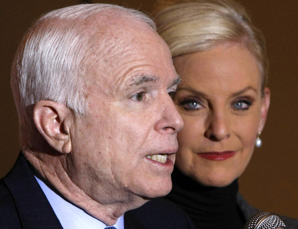 <p>Cindy McCain, wife of Republican presidential hopeful, Sen. John McCain, R-Ariz., looks on as he speaks at a news conference in Toledo, Ohio, Feb. 21, 2008. (Photo: Gerald Herber/AP) </p>