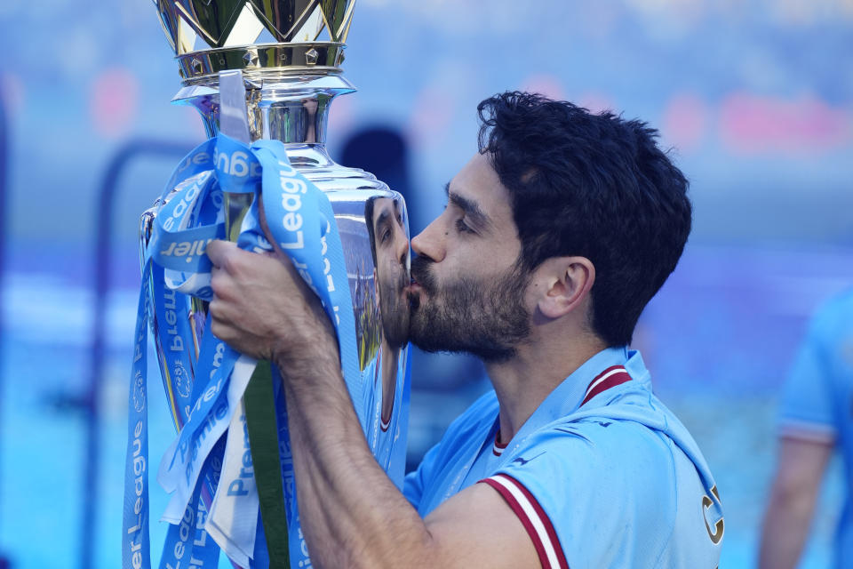 Manchester City's Ilkay Gundogan celebrates Premier League title after the English Premier League soccer match between Manchester City and Chelsea at the Etihad Stadium in Manchester, England, Sunday, May 21, 2023. (AP Photo/Jon Super)