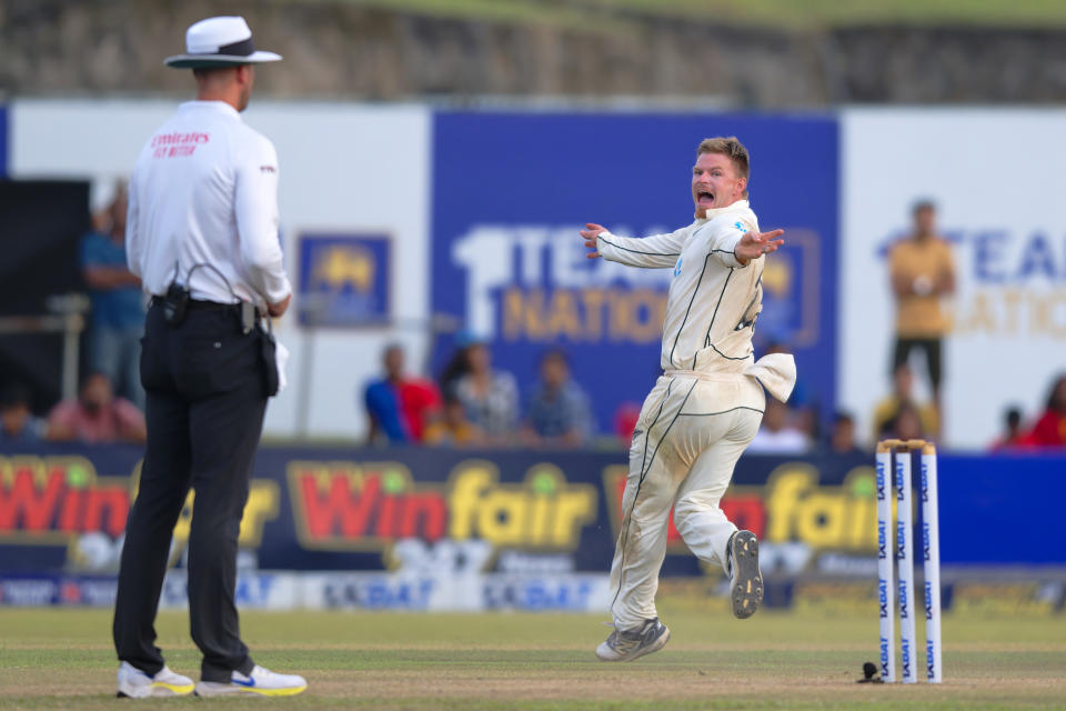 New Zealand's Glenn Phillips appeals unsuccessfully for the wicket of Sri Lanka's Angelo Mathews on the third day of the first cricket test match between New Zealand and Sri Lanka in Galle, Sri Lanka, Friday, Sept. 20, 2024. (AP Photo/Viraj Kothalawala)