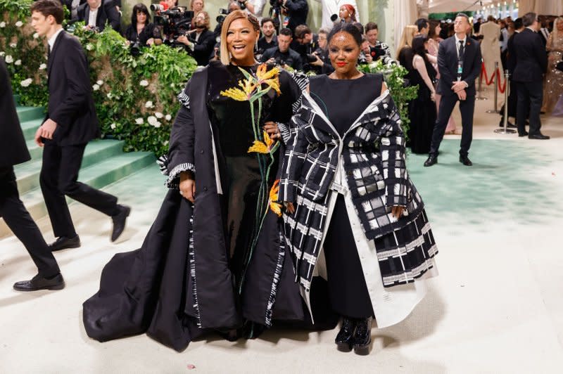 Eboni Nichols and Queen Latifah arrive on the red carpet at the 2024 Met Gala celebrating "Sleeping Beauties: Reawakening Fashion" at The Metropolitan Museum of Art on Monday in New York City. Photo by John Angelillo/UPI