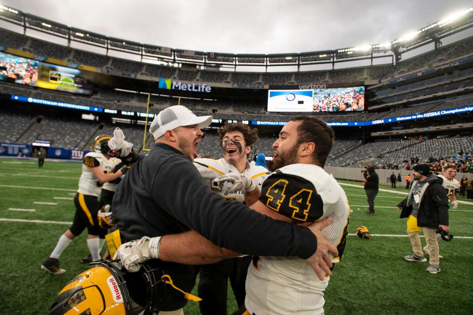 Cedar Grove celebrates defeating Park Ridge in the North Group 1 regional championship gameÊat MetLife Stadium on Friday, November 26, 2021. 