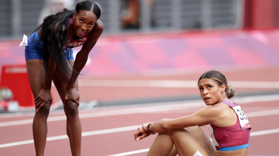 Gold medalist Sydney McLaughlin (right) and silver medalist Dalilah Muhammad didn't shatter the world record in the 400 hurdles thanks solely to the track or their spikes. (REUTERS/Hannah Mckay)