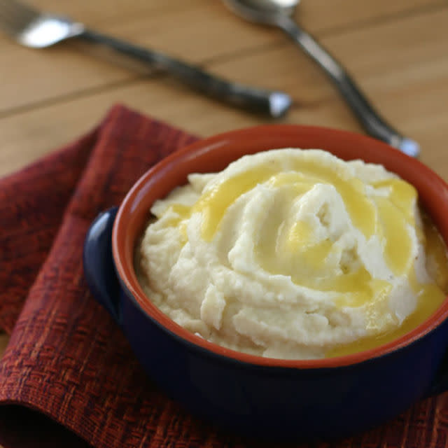 <p>Even the lightest and fluffiest mashed potatoes don't stand a chance against these florets.</p><p><strong>Get the recipe at <a rel="nofollow noopener" href="http://www.everydaymaven.com/2013/creamy-mashed-cauliflower-with-ghee-paleo/" target="_blank" data-ylk="slk:Everyday Maven;elm:context_link;itc:0;sec:content-canvas" class="link ">Everyday Maven</a>. </strong></p>