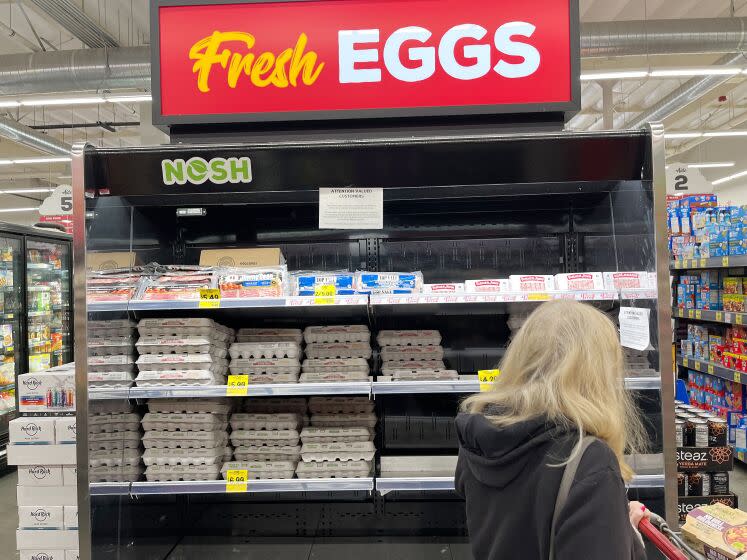 The average retail price for a dozen large eggs jumped to $7.37 in California this week, up from $4.83 at the beginning of December and just $2.35 at this time last year. A customer looks over the egg selection at Grocery Outlet Bargsain market Market in Redondo Beach on Thursday, Jan. 5, 2022. ( Jay Clendenin / Los Angeles Times )