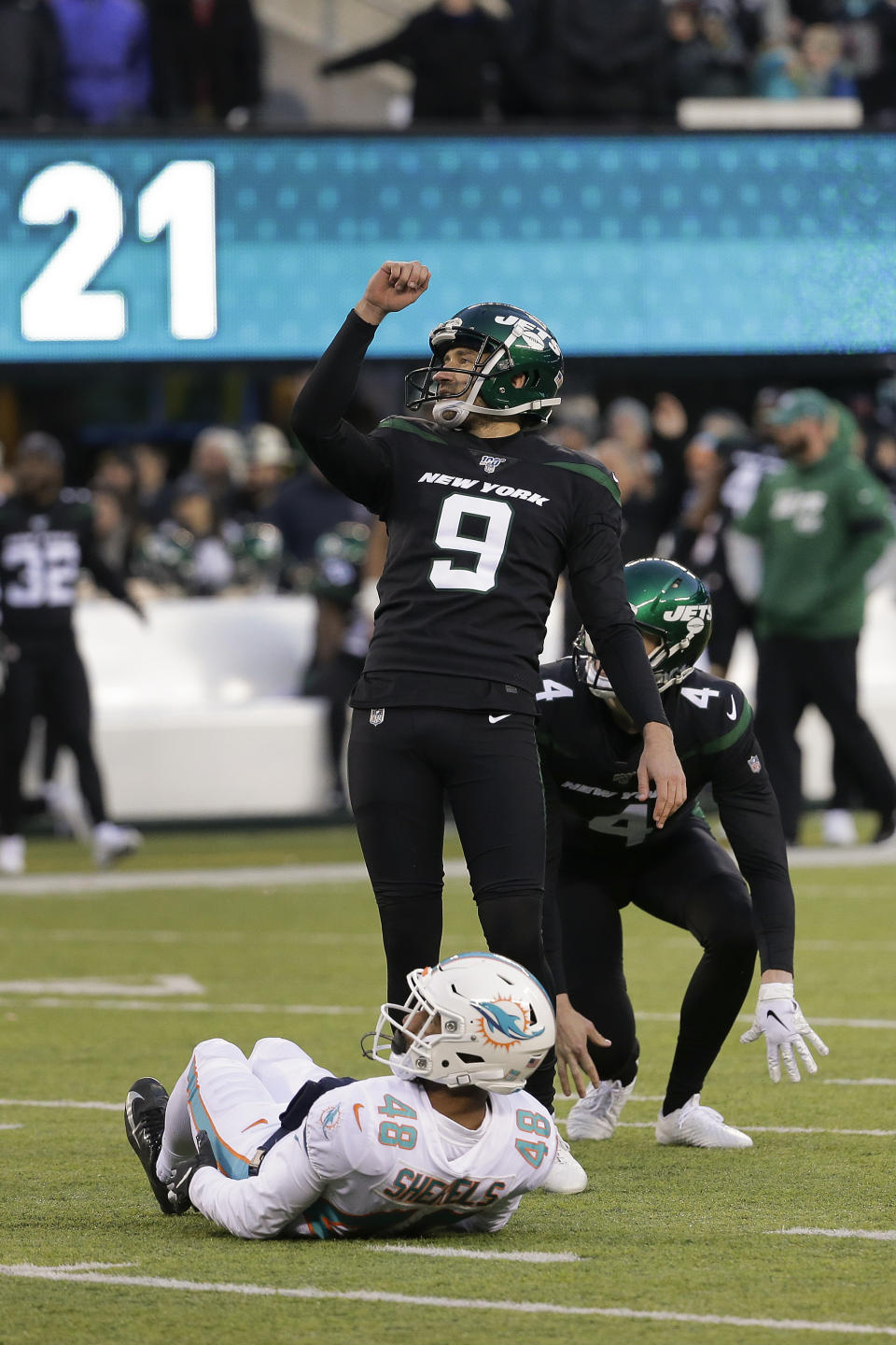 New York Jets kicker Sam Ficken (9) reacts as he watches his 44-yard field goal split the uprights against the Miami Dolphins to end an NFL football game, Sunday, Dec. 8, 2019, in East Rutherford, N.J. The Jets won 22-21.(AP Photo/Seth Wenig)