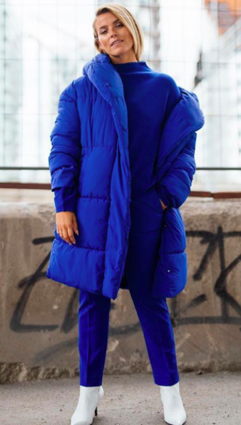 <p>Every fashion week, the street style set stepped out in a puffer or two. And this season, they’re mixing it up. Look for bold hues such as cobalt blue. <em>[Photo: @polliani]</em> </p>