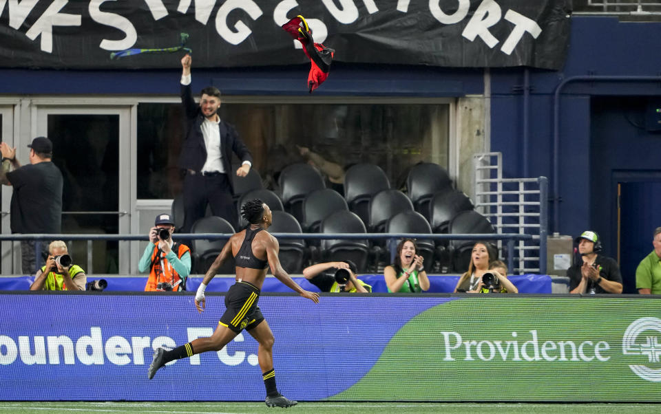 Seattle Sounders midfielder Léo Chú throws his jersey as he celebrates scoring against the Portland Timbers during the first half of an MLS soccer match Saturday, Sept. 2, 2023, in Seattle. (AP Photo/Lindsey Wasson)