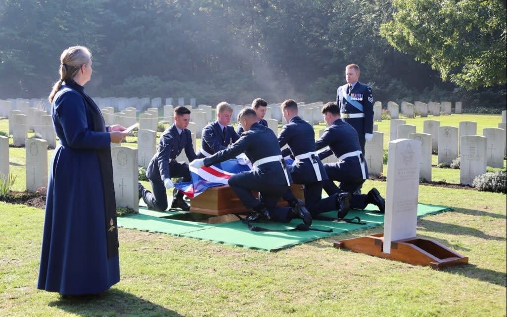 The RAF’s Queen’s Colour Squadron remove the Union Flag from Flt Sgt Hurrell’s coffin before laying him to rest - J.A.M.Y. (Jacqueline) Spijkerman