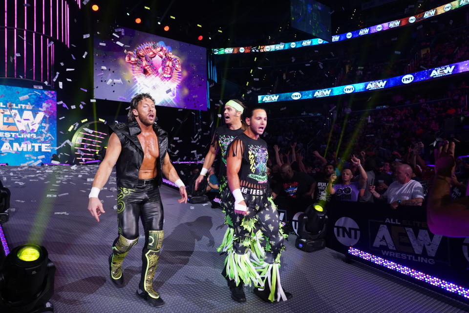 Fellow AEW executive vice presidents Kenny Omega, Matt and Nick Jackson are seen prior to a match on "Dynamite." (Photo credit: All Elite Wrestling)