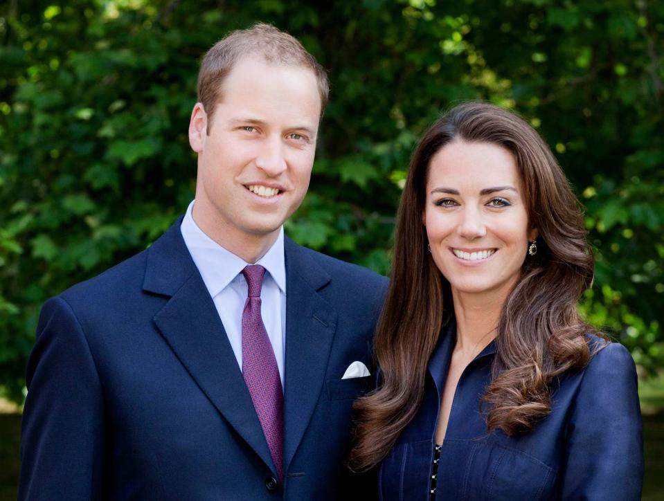 Prince William, Duke of Cambridge and Catherine, Duchess of Cambridge pose for the official tour portrait for their trip to Canada and California in the Garden's of Clarence House on June 3, 2011 in London. England