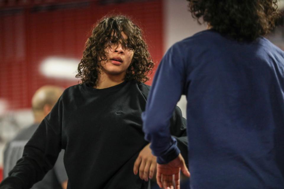 Nakayla Dawson, 15, of Westland, practices with her brother Robert Dawson, 17, during wrestling practice at Westland Glenn High School on Tuesday, Jan. 30, 2024.