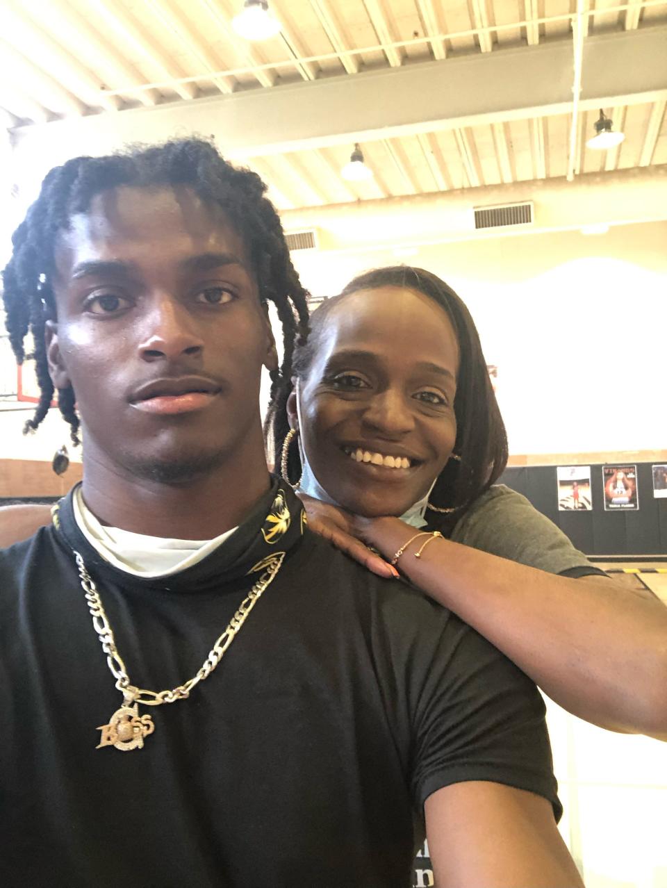 Missouri defensive back Ennis Rakestraw, left, poses for a photo with his mother, Shamika Quigley.