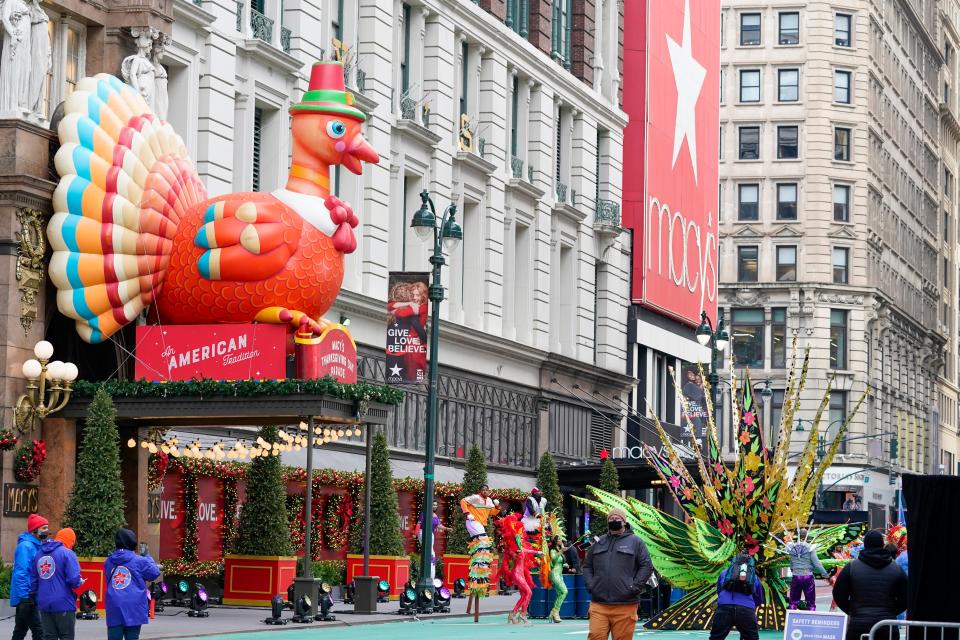 Performers dance along 34th Street during a pre-taping of the Macy's Thanksgiving Day Parade in front of the flagship store in New York, Wednesday, Nov. 25, 2020.