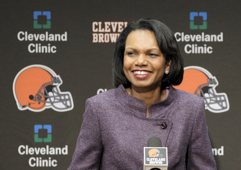 FILE- In this Oct. 21, 2010, file photo former Secretary of State Condoleezza Rice talks with the media after visiting with the Cleveland Browns coaches and players at the Browns training facility in Berea, Ohio. Browns general manager John Dorsey says the team has not discussed Rice as a candidate for its coaching vacancy. Rice is an avid Browns fan and has visited the team's headquarters on numerous occasions in recent years. (AP Photo/Amy Sancetta, File)