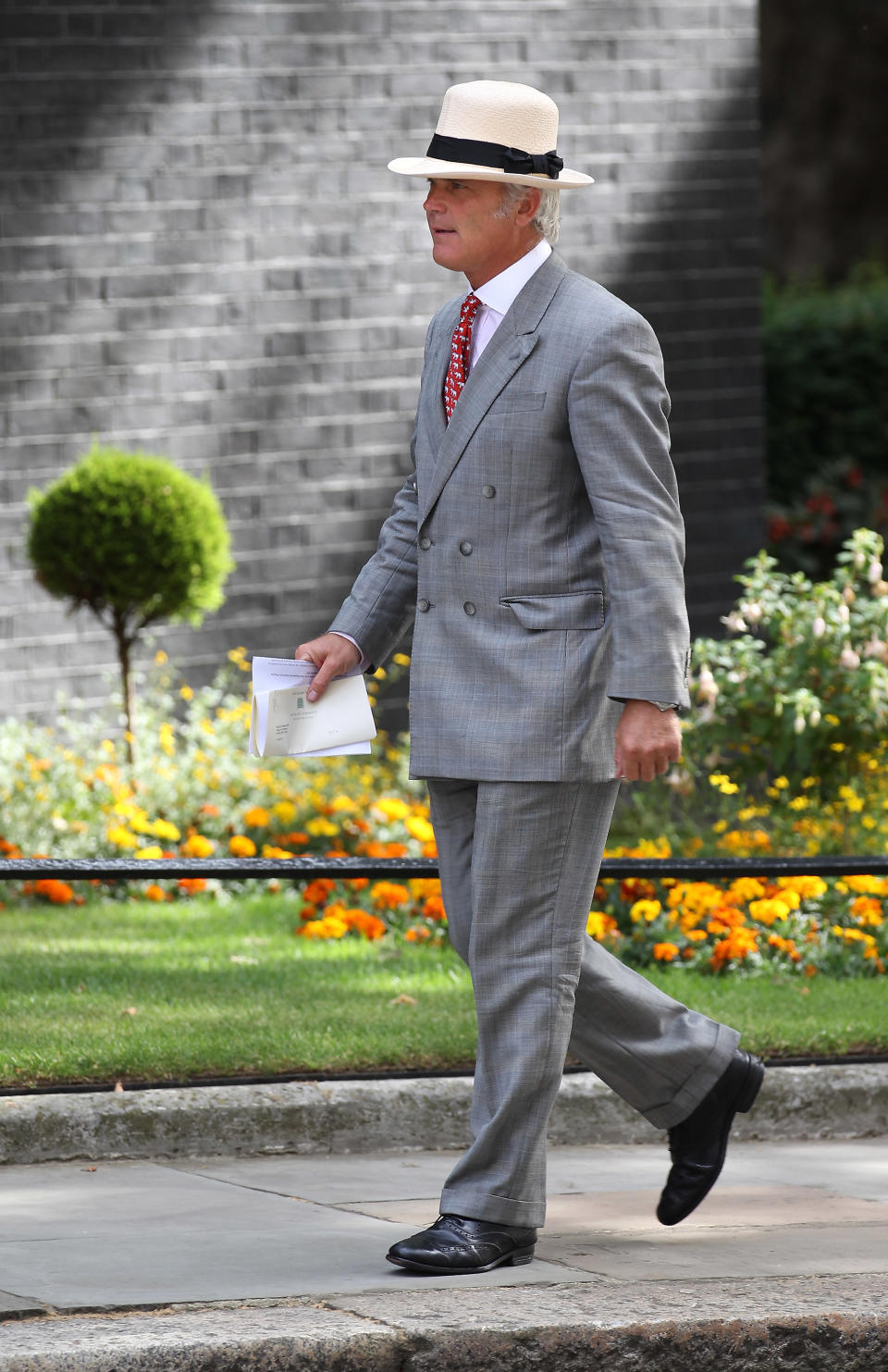 LONDON, ENGLAND - JULY 06: Desmond Swayne Parliamentary Secretary to Prime Minister David Cameron arrives in Downing Street on July 6, 2010 in London, England. Later Prime Minister David Cameron will chair a meeting of the National Security Council. (Photo by Peter Macdiarmid/Getty Images)