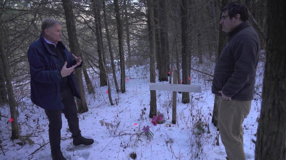 After carefully removing the needles stuck to the bottom of Joe Elledge's boots and extracting their DNA,  Alex Linan, was assigned to climb several juniper trees surrounding Mengji's grave. He meticulously numbered each tree and then scaled them one by one, picking fresh needles from the highest branches. / Credit: CBS News