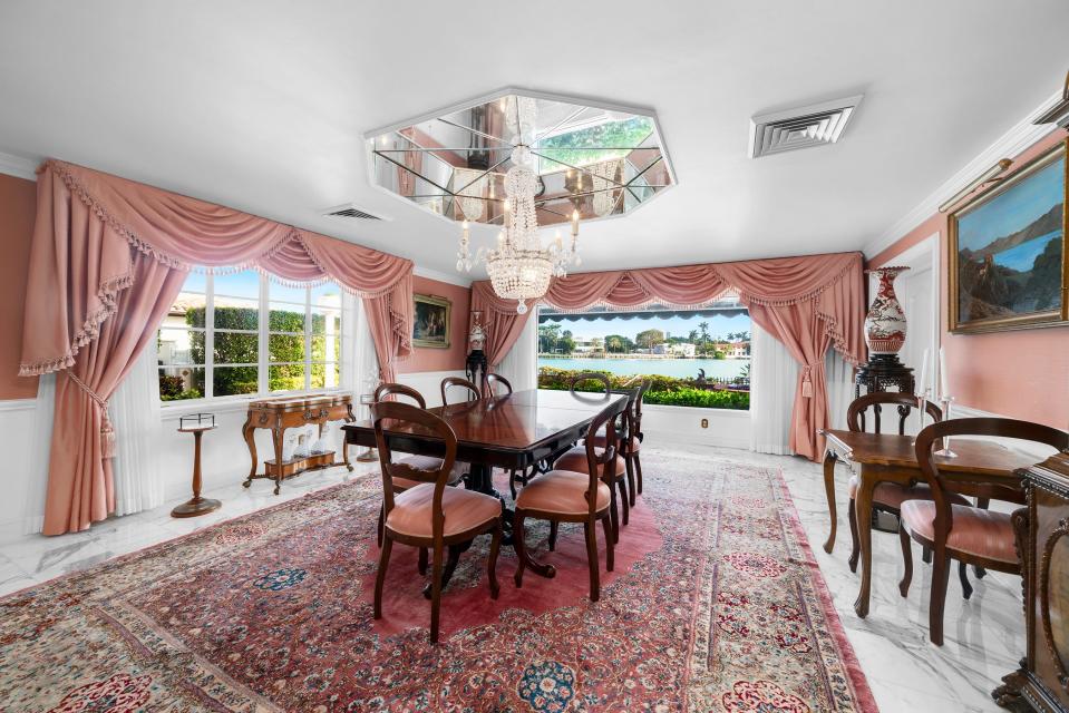 a room with many windows in the most expensive home currently for sale in Florida, 18 La Gorce Circle in Miami Beach