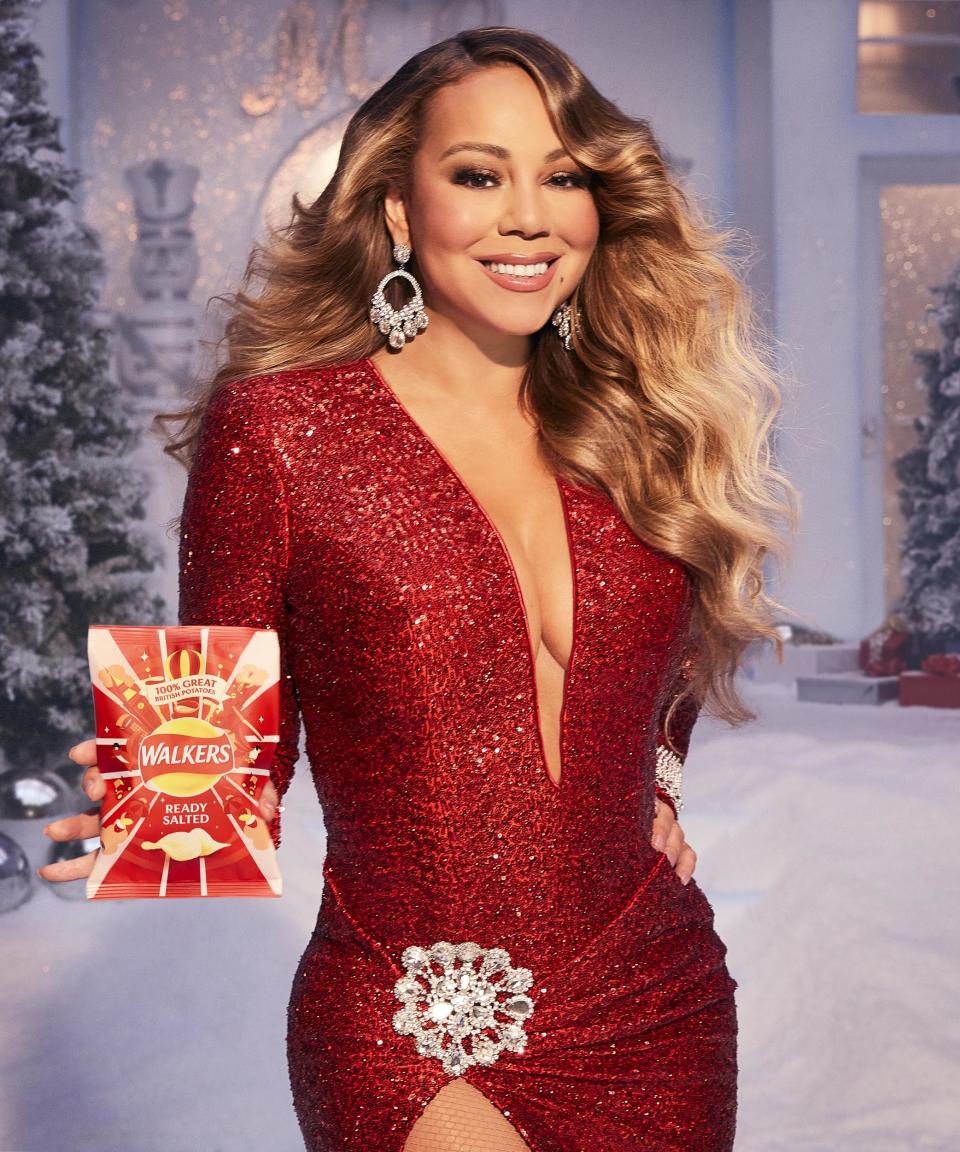 Queen of Christmas: Carey is known for her 1994 festive hit (Walkers)