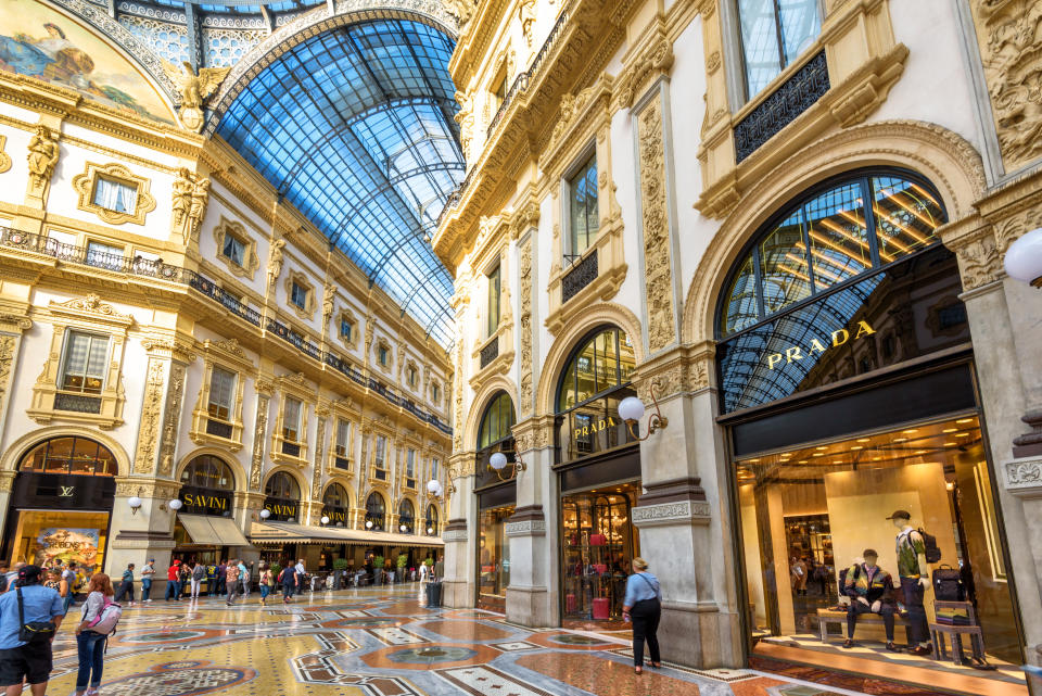 Milan, Italy - May 16, 2017: Panorama inside the Galleria Vittorio Emanuele II in Milan. This gallery is famous shopping mall and Milan landmark. Beautiful luxury interior of the old Milan store.