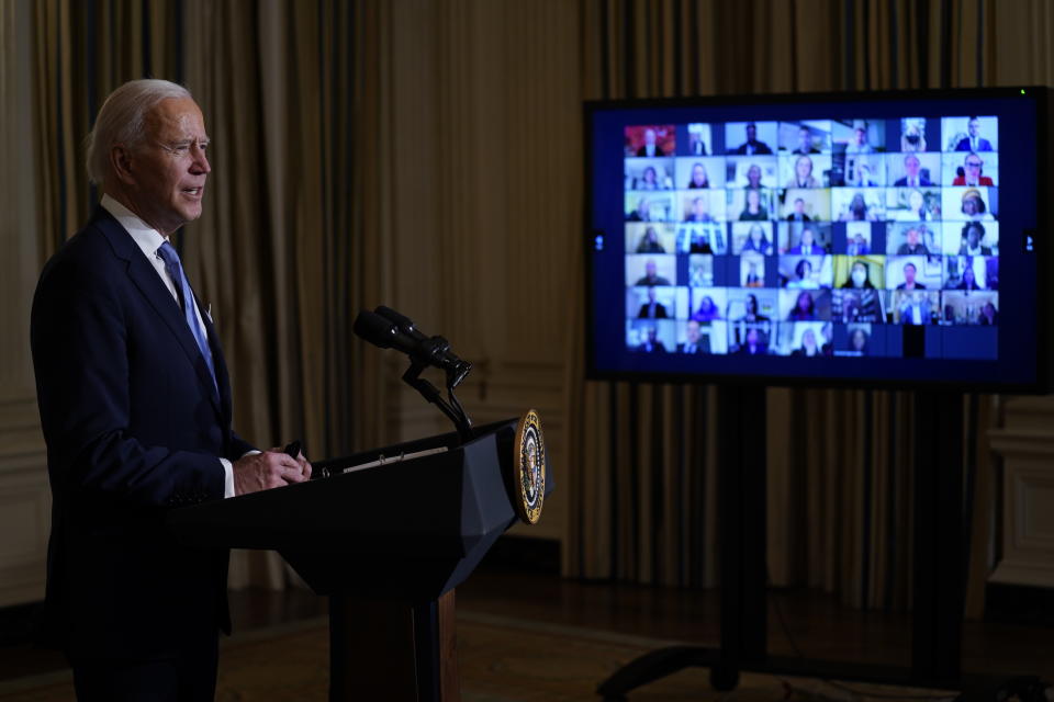 President Joe Biden speaks during a virtual swearing in ceremony of political appointees from the State Dining Room of the White House on Wednesday, Jan. 20, 2021, in Washington. (AP Photo/Evan Vucci)