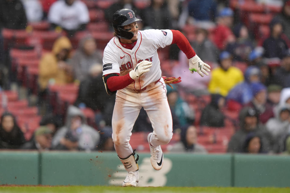 Boston Red Sox's Jarren Duran runs after hitting a two-run triple in the sixth inning of a baseball game against the Cleveland Guardians, Thursday, April 18, 2024, in Boston. (AP Photo/Steven Senne)
