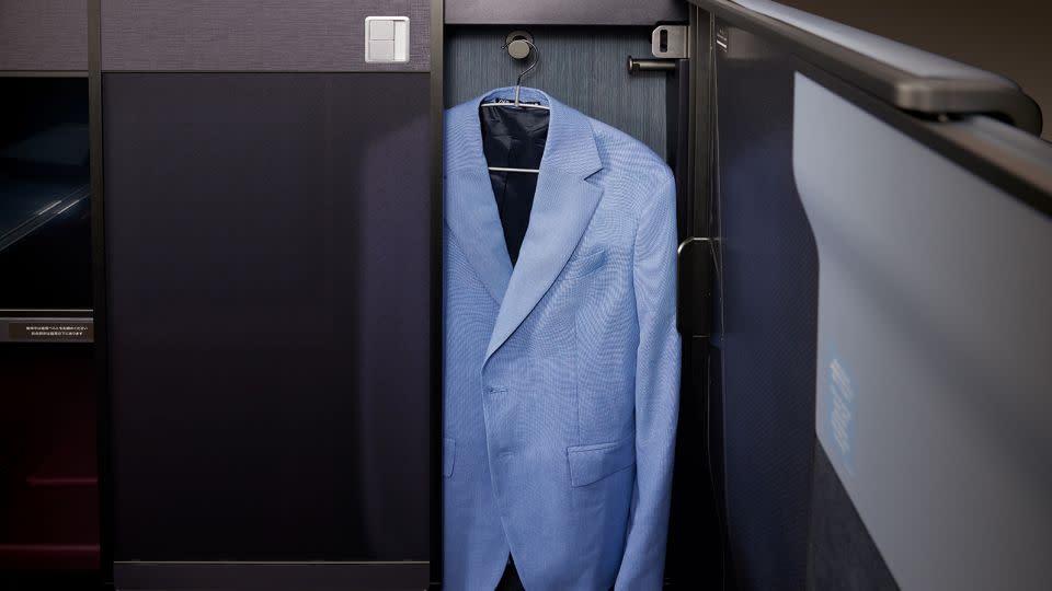 Each first-class suite has its own small closet. - Japan Airlines