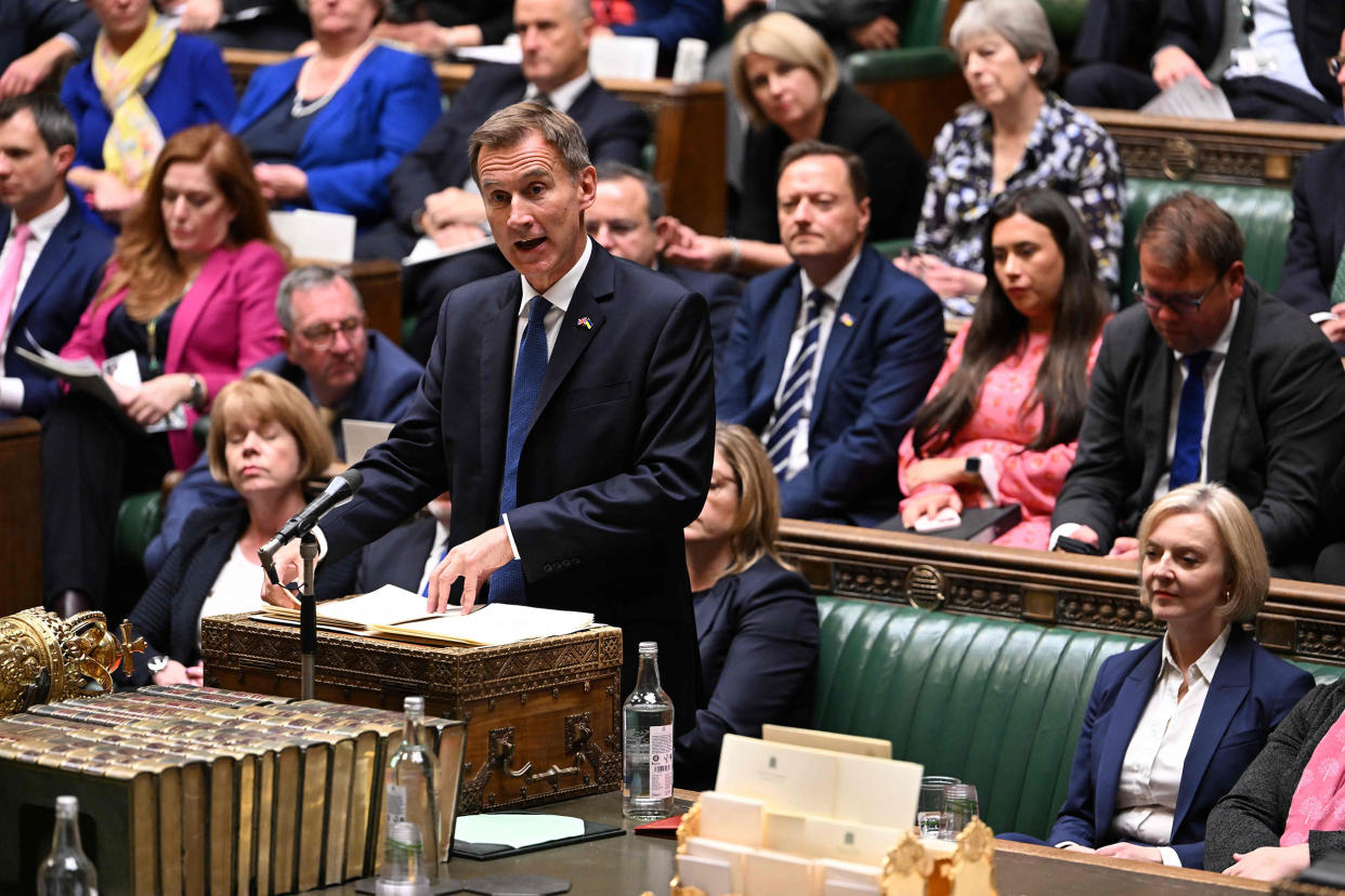 Britain's Chancellor of the Exchequer Jeremy Hunt at the House of Commons in London on Monday with Liz Truss seated on the right. (Jessica Taylor / U.K. Parliament via AFP - Getty Images)