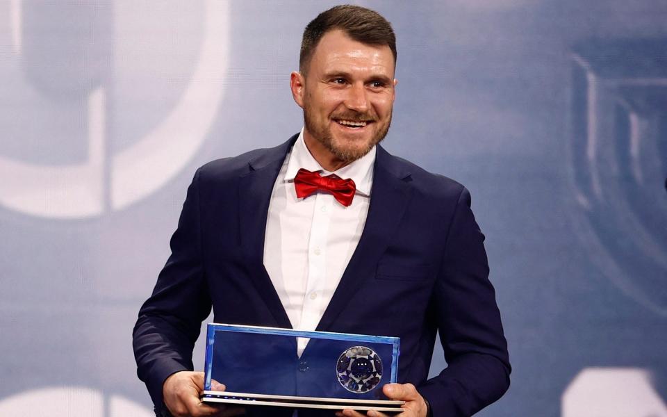 Marcin Oleksy receiving the Puskas Award during the Best FIFA Football Awards - Sarah Meyssonnier/Reuters