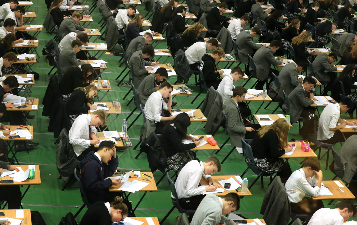 File photo dated 09/01/17 of students sitting their exams. Students in the UK are continuing to lag behind their peers from tiny European countries such as Estonia and Finland when it comes to maths, reading and science, a bellwether study of global education trends has suggested.