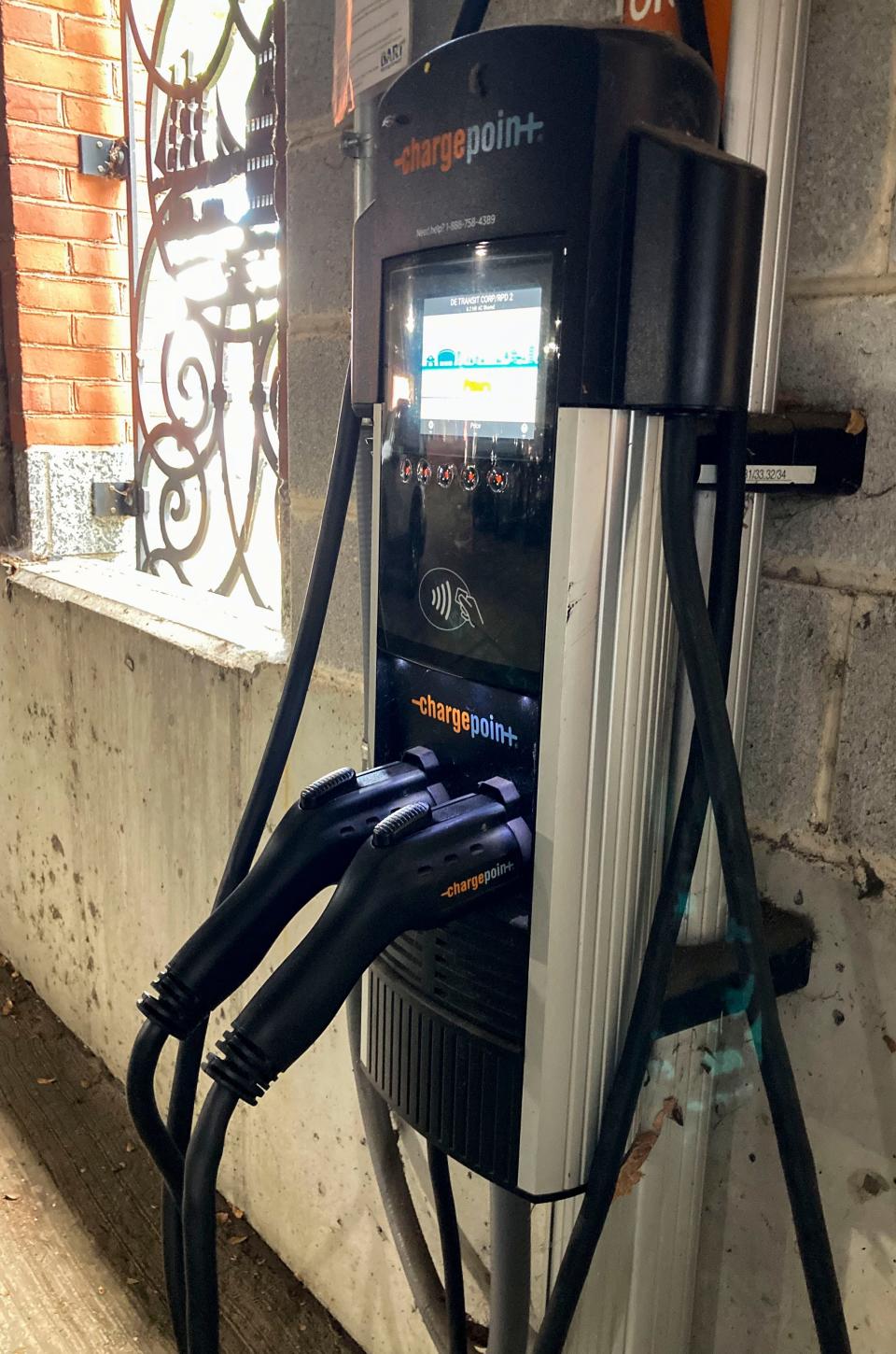 A twin electric vehicle charging station is one of a pair - for four total spaces - available in the parking garage adjacent to the Wilmington Amtrak Station, seen Saturday, June 24, 2023.