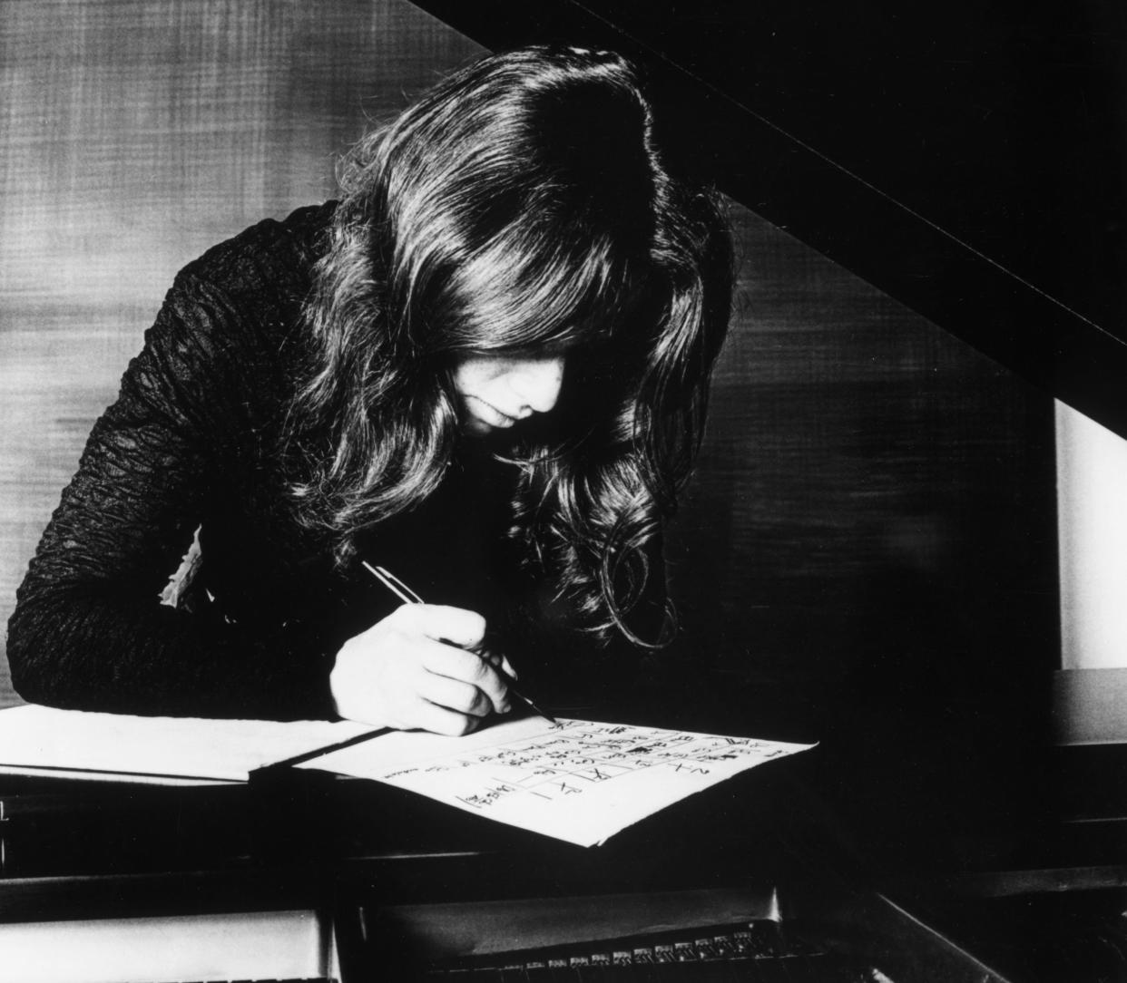 <p>Carole King working at the piano in 1970, the year before Tapestry was released</p> (Getty)