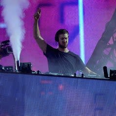 Calvin Harris performing with his turntables at Coachella