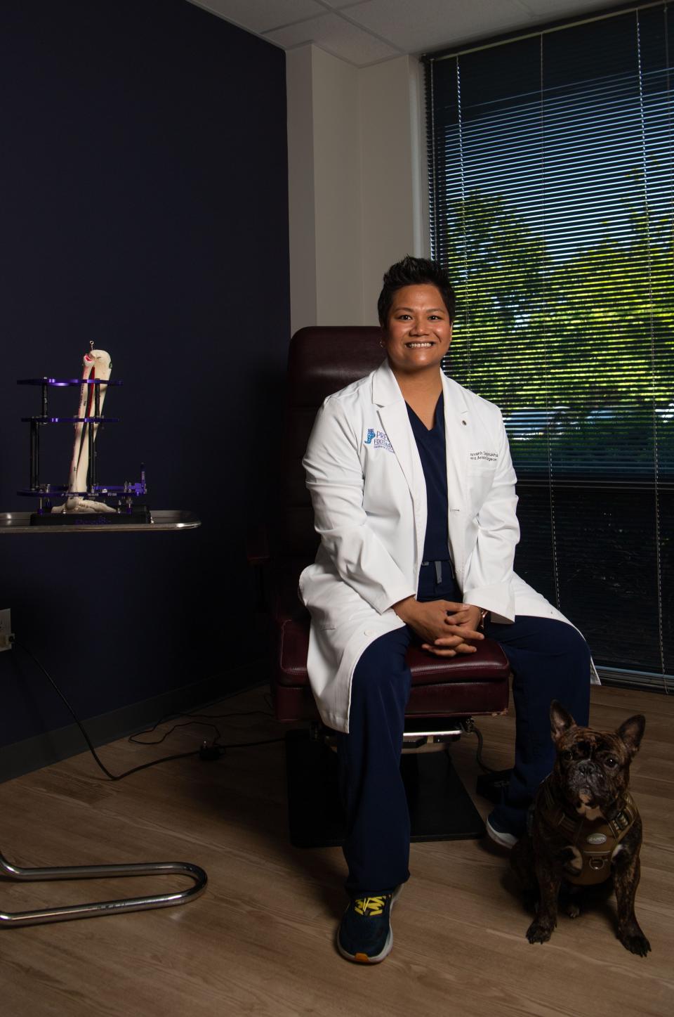 Dr. Vilayvanh Saysoukha, a podiatrist at the Premier Foot and Ankle Center in Murfreesboro, Tenn., Monday, May 20, 2024. Saysoukha is a first-generation Laotian American who was an early recipient of Tennessee HOPE scholarship, funded by the state lottery.