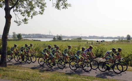 Tinkoff-Saxo team rider Alberto Contador of Spain (4thR) pedals with his team mates during a training session in Utrecht, Netherlands, July 2, 2015. REUTERS/Stefano Rellandini