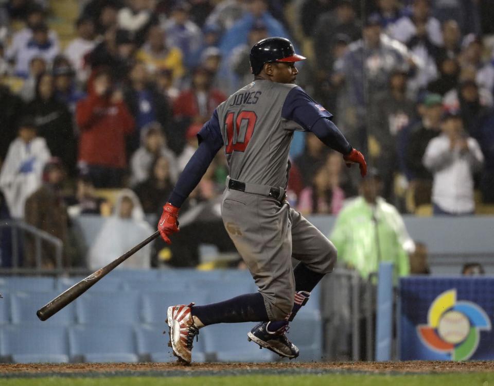 United States' Adam Jones grounds out during the eighth inning of a semifinal in the World Baseball Classic against Japan, in Los Angeles, Tuesday, March 21, 2017. Brandon Crawford scored on the ground out. (AP Photo/Chris Carlson)