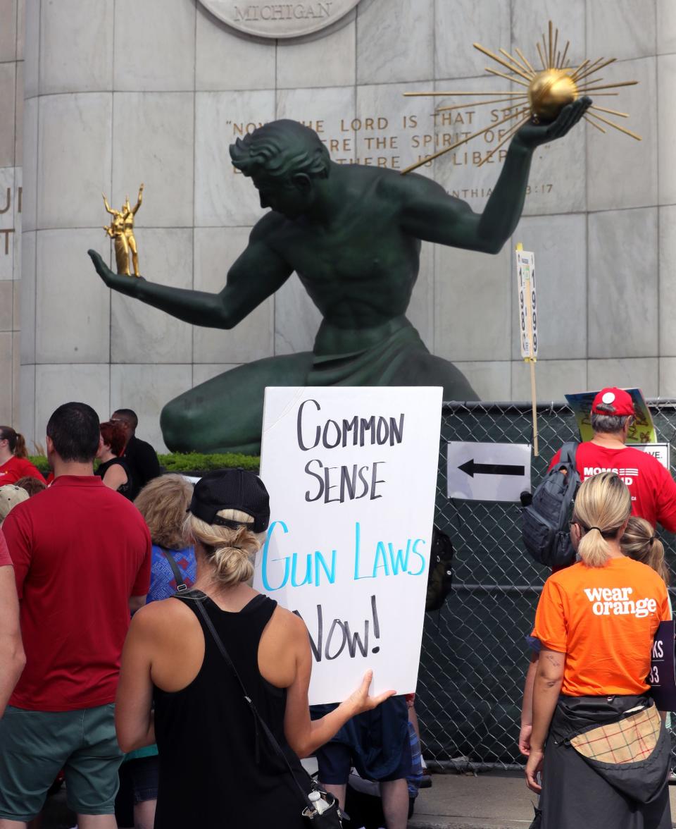 The crowd came to the Michigan Moms Against Gun Violence rally at Spirit Plaza in Detroit with a variety of signs Sunday, August 18, 2019.