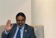 India's Trade Minister Anand Sharma gestures as he speaks during an interview with Reuters as meetings continue to take place into the night at ninth World Trade Organization (WTO) Ministerial Conference in Nusa Dua, on the Indonesian resort island of Bali December 6, 2013. Sharma said on Friday he would endorse a draft trade reform at the World Trade Organization, removing a major obstacle to a deal. REUTERS/Edgar Su