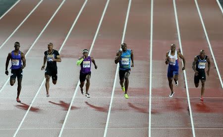 Athletics - IAAF Diamond League 2015 - Sainsbury's Anniversary Games - Queen Elizabeth Olympic Park, London, England - 24/7/15 Jamaica's Usain Bolt (C) wins the Mens' 100m Action Images via Reuters / Matthew Childs Livepic