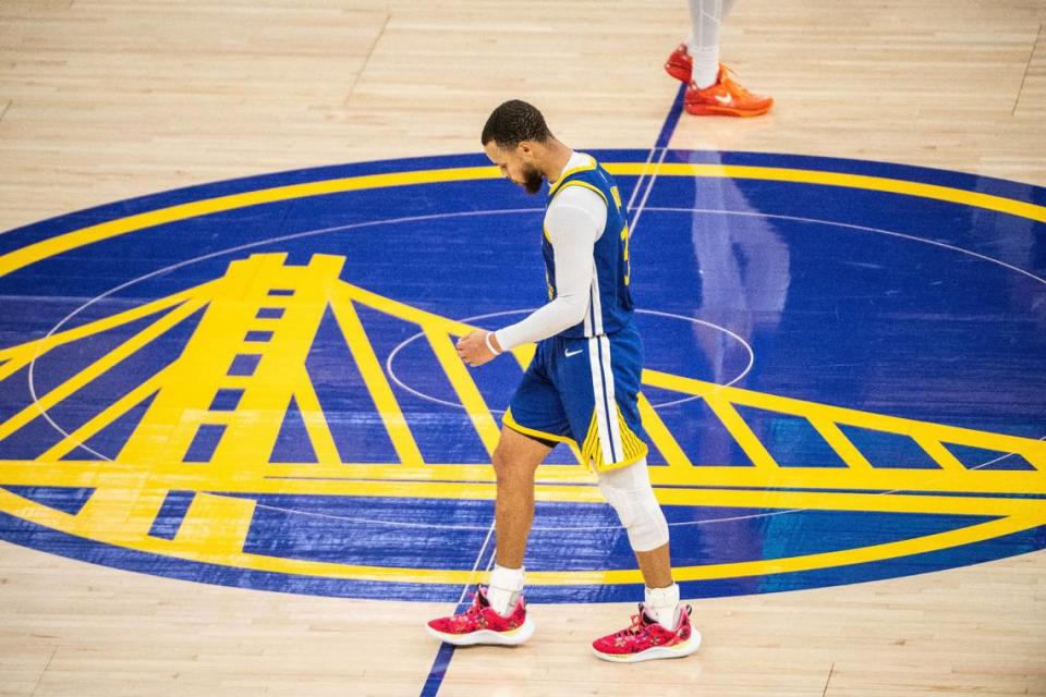 Golden State Warriors guard Stephen Curry (30) walks to past half court as his team trails during Game 6 of the first-round NBA playoff series at Chase Center on Friday, April 28, 2023.