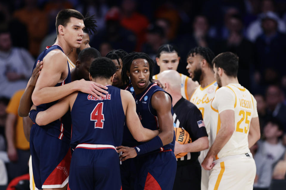 Florida Atlantic team members huddle during the second half of a Sweet 16 college basketball game against Tennessee in the East Regional of the NCAA tournament at Madison Square Garden, Thursday, March 23, 2023, in New York. (AP Photo/Adam Hunger)