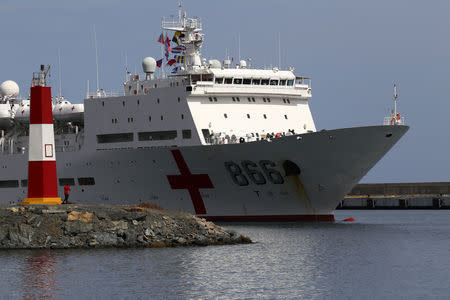 China's People's Liberation Army (PLA) Navy hospital ship Peace Ark, prepares to dock at the port in La Guaira, Venezuela September 22, 2018. REUTERS/Manaure Quintero